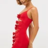 Aniela Abito corto in jersey elasticizzato con dettagli a rose in rosso scarlatto Aniela Abito corto in jersey elasticizzato con dettagli a rose in rosso scarlatto