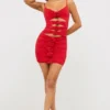 Aniela Abito corto in jersey elasticizzato con dettagli a rose in rosso scarlatto Aniela Abito corto in jersey elasticizzato con dettagli a rose in rosso scarlatto