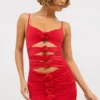 Aniela Abito corto in jersey elasticizzato con dettagli a rose in rosso scarlatto Aniela Abito corto in jersey elasticizzato con dettagli a rose in rosso scarlatto