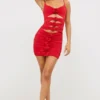Aniela Abito corto in jersey elasticizzato con dettagli a rose in rosso scarlatto Aniela Abito corto in jersey elasticizzato con dettagli a rose in rosso scarlatto