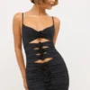 Aniela Vestito corto in jersey elasticizzato con dettagli a rosa e cut-out in nero Aniela Vestito corto in jersey elasticizzato con dettagli a rosa e cut-out in nero