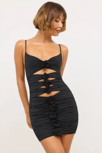 Aniela Vestito corto in jersey elasticizzato con dettagli a rosa e cut-out in nero Aniela Vestito corto in jersey elasticizzato con dettagli a rosa e cut-out in nero
