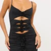 Aniela Vestito corto in jersey elasticizzato con dettagli a rosa e cut-out in nero Aniela Vestito corto in jersey elasticizzato con dettagli a rosa e cut-out in nero
