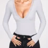 Body a maniche lunghe con scollo profondo in modal a coste Verity, colore grigio Body a maniche lunghe con scollo profondo in modal a coste Verity, colore grigio