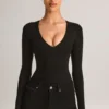 Body a maniche lunghe con scollo profondo in modal Elodie, colore nero Body a maniche lunghe con scollo profondo in modal Elodie, colore nero