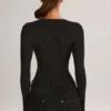 Body a maniche lunghe con scollo profondo in modal Elodie, colore nero Body a maniche lunghe con scollo profondo in modal Elodie, colore nero