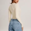 Body a maniche lunghe Elodie Modal Plunge in avorio Body a maniche lunghe Elodie Modal Plunge in avorio