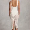 Body Caia in pizzo trasparente con scollo a V smerlato, colore bianco Body Caia in pizzo trasparente con scollo a V smerlato, colore bianco