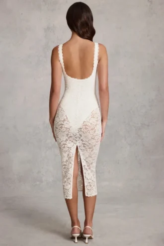 Body Caia in pizzo trasparente con scollo a V smerlato, colore bianco Body Caia in pizzo trasparente con scollo a V smerlato, colore bianco