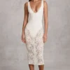 Body Caia in pizzo trasparente con scollo a V smerlato, colore bianco Body Caia in pizzo trasparente con scollo a V smerlato, colore bianco