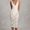 Body Caia in pizzo trasparente con scollo a V smerlato, colore bianco Body Caia in pizzo trasparente con scollo a V smerlato, colore bianco