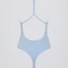 Body con cut-out in azzurro Body con cut-out in azzurro