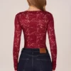 Body con pizzo a maniche lunghe Letizia in rosso ciliegia Body con pizzo a maniche lunghe Letizia in rosso ciliegia
