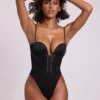 Body corsetto con scollo a V e allacciatura in raso Yelda, nero Body corsetto con scollo a V e allacciatura in raso Yelda, nero