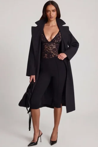 Body Zayla in pizzo trasparente con scollo a V smerlato, nero