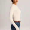 Body Ziva in modal a maniche lunghe con scollo rotondo, color crema Body Ziva in modal a maniche lunghe con scollo rotondo, color crema