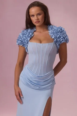 Bolero corto Soretta in blu polvere Bolero corto Soretta in blu polvere