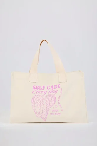 Borsa tote oversize in tela color guscio d’uovo