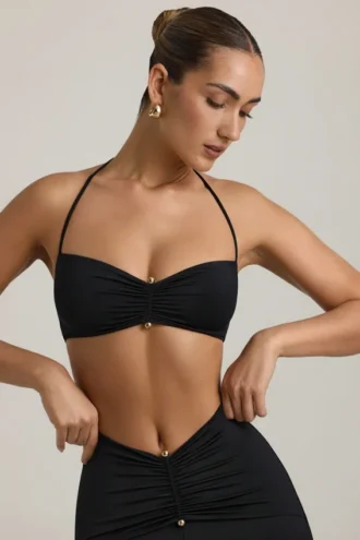 Bralette con scollo all’americana e dettagli metallici in jersey elasticizzato nero