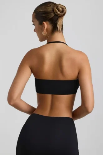 Bralette con scollo all’americana e dettagli metallici in jersey elasticizzato nero