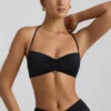 Bralette con scollo all’americana e dettagli metallici in jersey elasticizzato nero Bralette con scollo all’americana e dettagli metallici in jersey elasticizzato nero