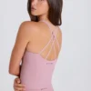 Canotta lunga con spalline incrociate in malva Canotta lunga con spalline incrociate in malva