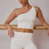 Canotta monospalla intrecciata in bianco tenue Canotta monospalla intrecciata in bianco tenue