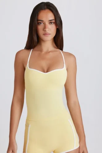 Canotta Soft Active con spalline incrociate in giallo limone