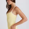 Canotta Soft Active con spalline incrociate in giallo limone Canotta Soft Active con spalline incrociate in giallo limone
