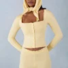 Cardigan a maniche lunghe in maglia Tahlia, colore giallo burro Cardigan a maniche lunghe in maglia Tahlia, colore giallo burro