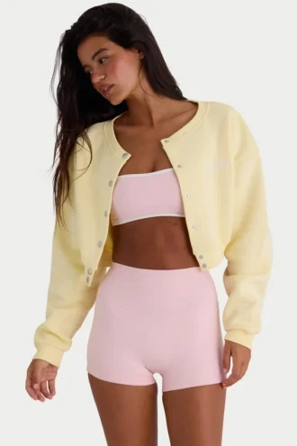 Cardigan corto abbottonato in jersey spazzolato, colore giallo tenue