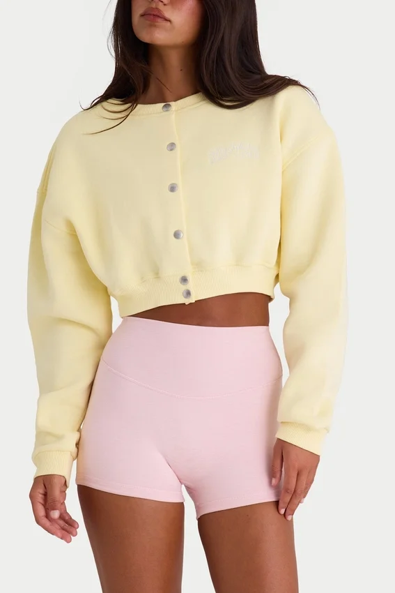 Cardigan corto abbottonato in jersey spazzolato, colore giallo tenue