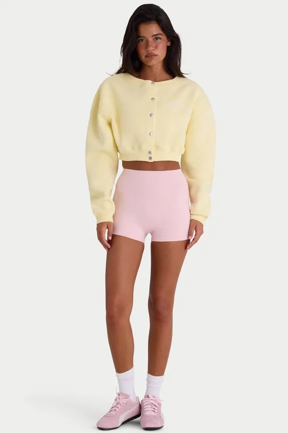 Cardigan corto abbottonato in jersey spazzolato, colore giallo tenue