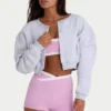 Cardigan corto abbottonato in jersey spazzolato grigio melange Cardigan corto abbottonato in jersey spazzolato grigio melange
