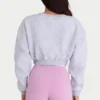 Cardigan corto abbottonato in jersey spazzolato grigio melange Cardigan corto abbottonato in jersey spazzolato grigio melange