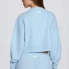 Cardigan corto in maglia blu polvere