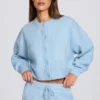 Cardigan corto in maglia blu polvere