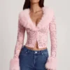 Cardigan Noemy in pizzo trasparente con bordi in pelliccia sintetica, colore rosa Cardigan Noemy in pizzo trasparente con bordi in pelliccia sintetica, colore rosa