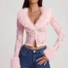 Cardigan Noemy in pizzo trasparente con bordi in pelliccia sintetica, colore rosa Cardigan Noemy in pizzo trasparente con bordi in pelliccia sintetica, colore rosa