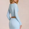 Cardigan scollato in pizzo Odelia in blu polvere Cardigan scollato in pizzo Odelia in blu polvere