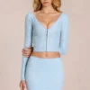 Cardigan scollato in pizzo Odelia in blu polvere Cardigan scollato in pizzo Odelia in blu polvere