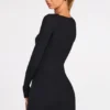 Caris Vestito corto nero con reggiseno allacciato a maniche lunghe in modal a coste Caris Vestito corto nero con reggiseno allacciato a maniche lunghe in modal a coste