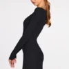 Caris Vestito corto nero con reggiseno allacciato a maniche lunghe in modal a coste Caris Vestito corto nero con reggiseno allacciato a maniche lunghe in modal a coste