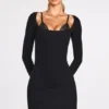 Caris Vestito corto nero con reggiseno allacciato a maniche lunghe in modal a coste Caris Vestito corto nero con reggiseno allacciato a maniche lunghe in modal a coste
