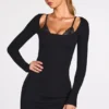 Caris Vestito corto nero con reggiseno allacciato a maniche lunghe in modal a coste Caris Vestito corto nero con reggiseno allacciato a maniche lunghe in modal a coste