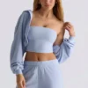 Copri spalle corto con cappuccio in jersey spazzolato, colore blu tenue Copri spalle corto con cappuccio in jersey spazzolato, colore blu tenue