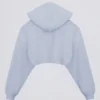 Copri spalle corto con cappuccio in jersey spazzolato, colore blu tenue Copri spalle corto con cappuccio in jersey spazzolato, colore blu tenue