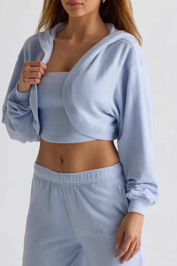 Copri spalle corto con cappuccio in jersey spazzolato, colore blu tenue Copri spalle corto con cappuccio in jersey spazzolato, colore blu tenue