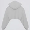 Copri spalle corto con cappuccio in jersey spazzolato, colore grigio nebbia Copri spalle corto con cappuccio in jersey spazzolato, colore grigio nebbia