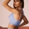 Corsetto con collo a cappuccio decorato Selena in blu Corsetto con collo a cappuccio decorato Selena in blu